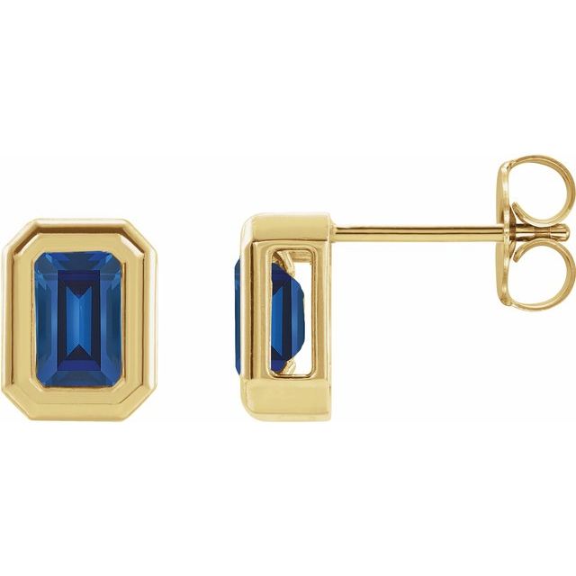 14k yellow gold art deco stud earrings — worn on ear
