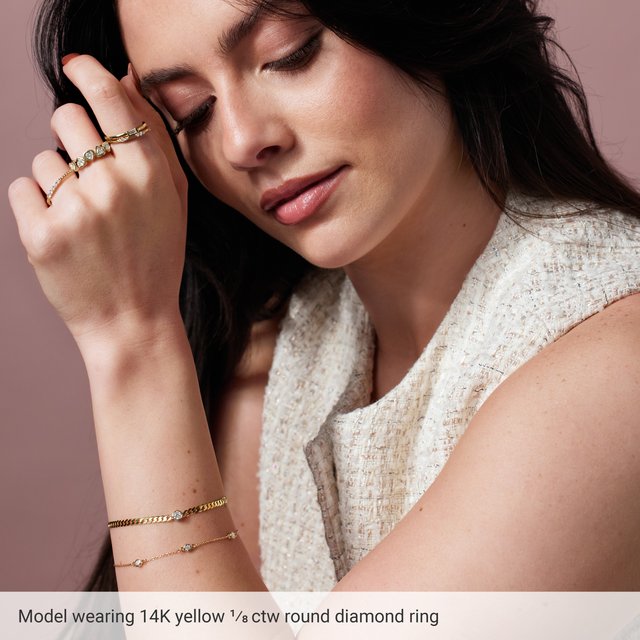 14k yellow gold diamond band ring — close-up