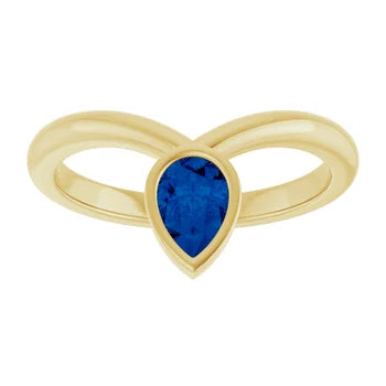 14k yellow gold candlelight ring with sapphire — lifestyle