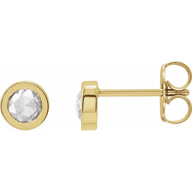 14k yellow gold rose-cut diamond bezel studs — worn on ear