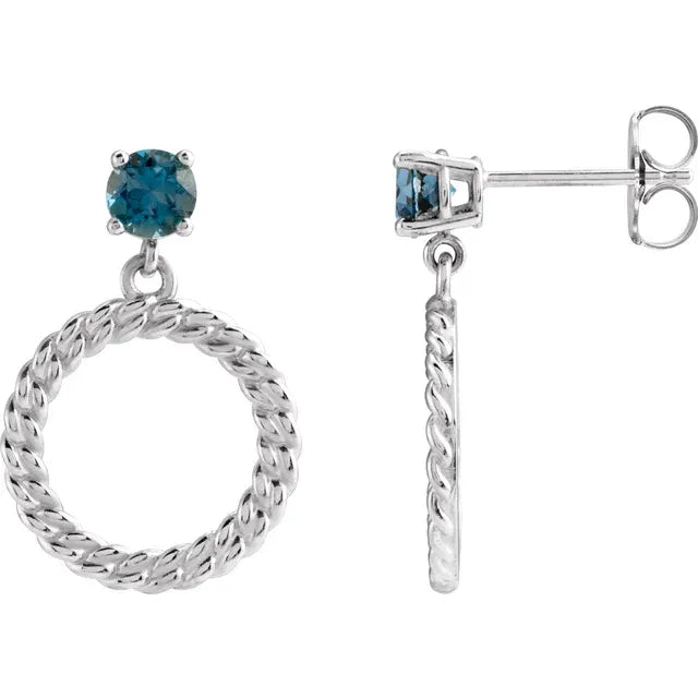Sterling silver curb chain drop earrings with blue topaz — front view