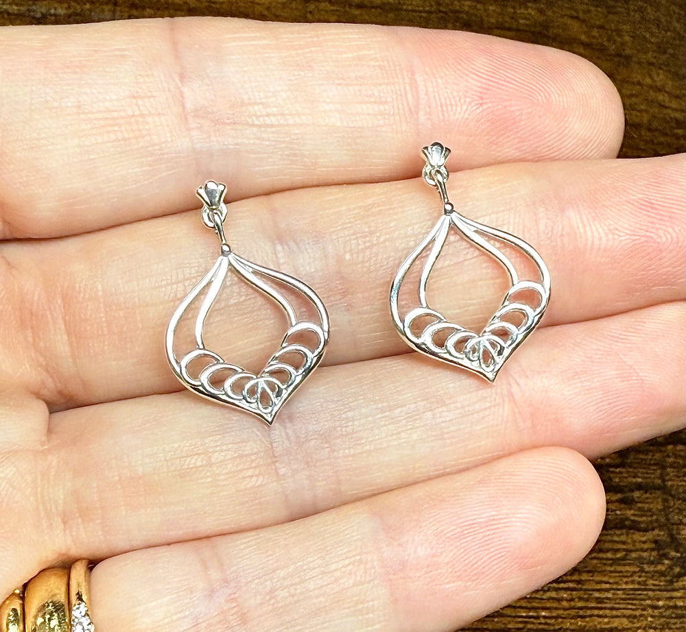 14k yellow gold water lily drop earrings — worn on ear
