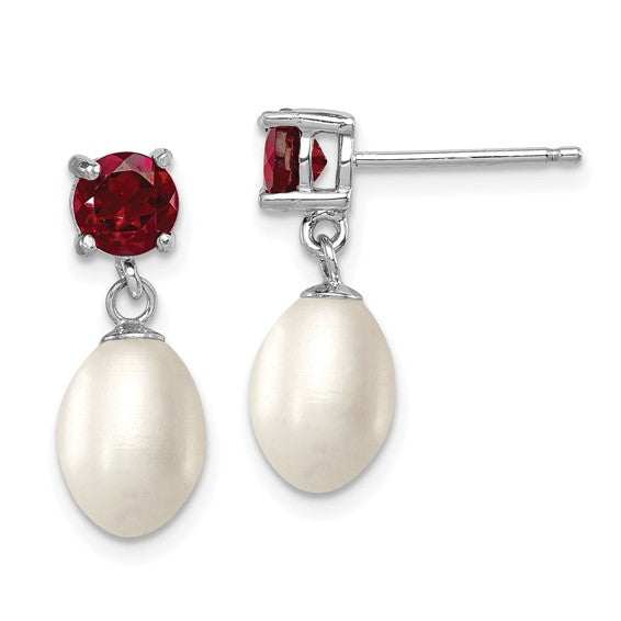 Sterling silver pearl droplet earrings — close-up detail