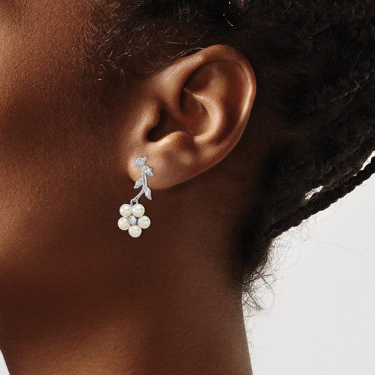 Sterling silver freshwater pearl floral drop earrings — lifestyle styled
