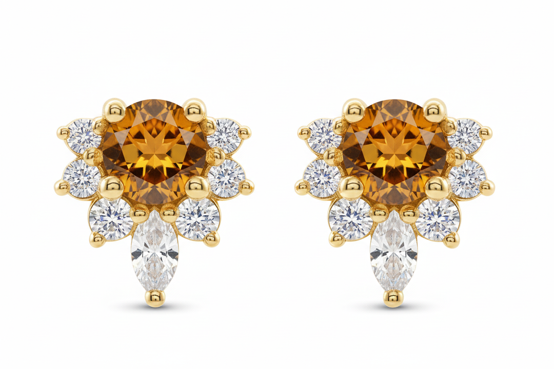 14k yellow gold vampy studs with emerald — front view