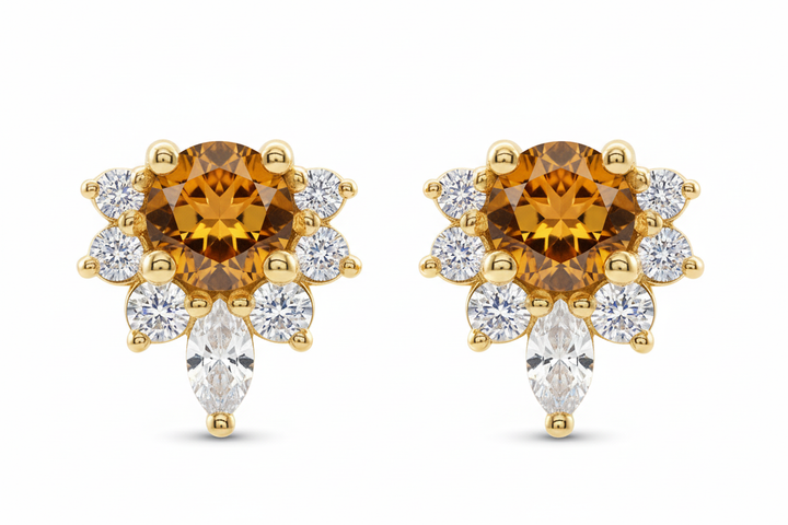 14k yellow gold vampy studs with emerald — front view